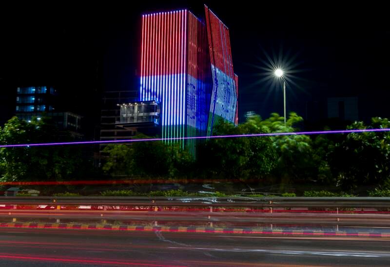 A building is illuminated with the Indian national flag on the outskirts of New Delhi. Getty