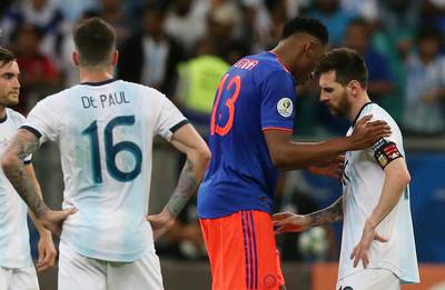 Argentina's Lionel Messi and Colombia's Yerry Mina after the match. Reuters