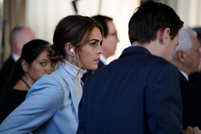 Counsellor to the President, Hope Hicks, listens as President Donald Trump speaks during a Fox News virtual town hall from the Lincoln Memorial, in Washington. Treasury Secretary Steven Mnuchin, background centre and Vice President Mike Pence, background right, listen. AP Photo