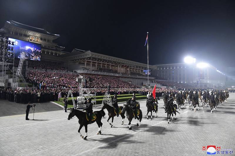 North Korean soldiers on horses parade during the celebration of the nation’s 73rd anniversary.  AP