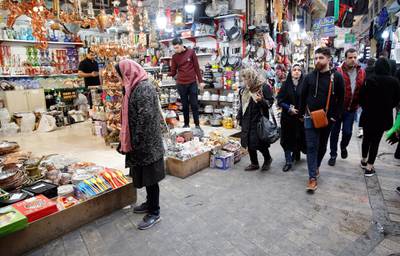 epa07142677 Iranians shop in a bazaar in Tehran, Iran, 05 November 2018. US President Donald J. Trump's administration announced on 02 November 2018, that it will reimpose sanctions against Iran that had been waived under the 2015 Iran nuclear deal (the Joint Comprehensive Plan of Action, JCPOA). The US sanctions will take effect on 05 November 2018, covering Iran's shipping, financial and energy sectors. In 2015, five nations, including the United States, worked out a deal with the Middle Eastern country that withdrew the sanctions, one of former US President Barack Obama's biggest diplomatic achievements.  EPA/ABEDIN TAHERKENAREH