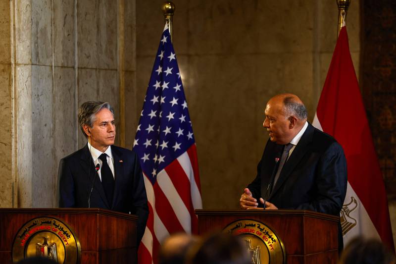 Mr Blinken, left, and Egyptian Foreign Minister Sameh Shoukry speak to the media in Cairo. AFP