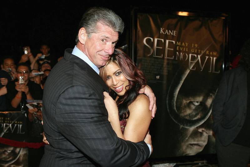 Vince McMahon hugs WWE women's wrestler Melina at the Lionsgate premiere of 'See No Evil' on May 8, 2006 in Orange, California. Getty Images