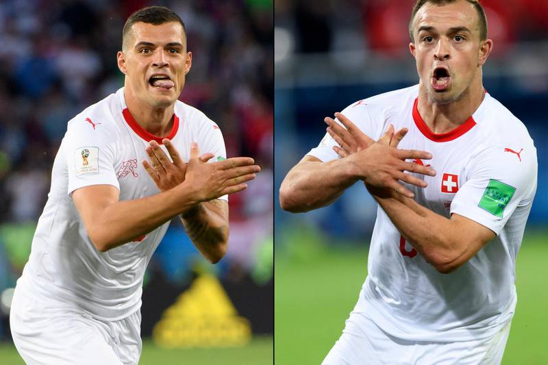 epa06832171 A combo of two pictures shows the celebration for the first goal of Switzerland's midfielder Granit Xhaka, (L), and the victory goal of Switzerland's midfielder Xherdan Shaqiri, (R), both making the eagle emblem of the Kosovo during the FIFA World Cup 2018 group E preliminary round soccer match between Switzerland and Serbia at the Arena Baltika Stadium, in Kaliningrad, Russia, Friday, June 22, 2018. 


(RESTRICTIONS APPLY: Editorial Use Only, not used in association with any commercial entity - Images must not be used in any form of alert service or push service of any kind including via mobile alert services, downloads to mobile devices or MMS messaging - Images must appear as still images and must not emulate match action video footage - No alteration is made to, and no text or image is superimposed over, any published image which: (a) intentionally obscures or removes a sponsor identification image; or (b) adds or overlays the commercial identification of any third party which is not officially associated with the FIFA World Cup)  EPA/LAURENT GILLIERON   EDITORIAL USE ONLY  EDITORIAL USE ONLY