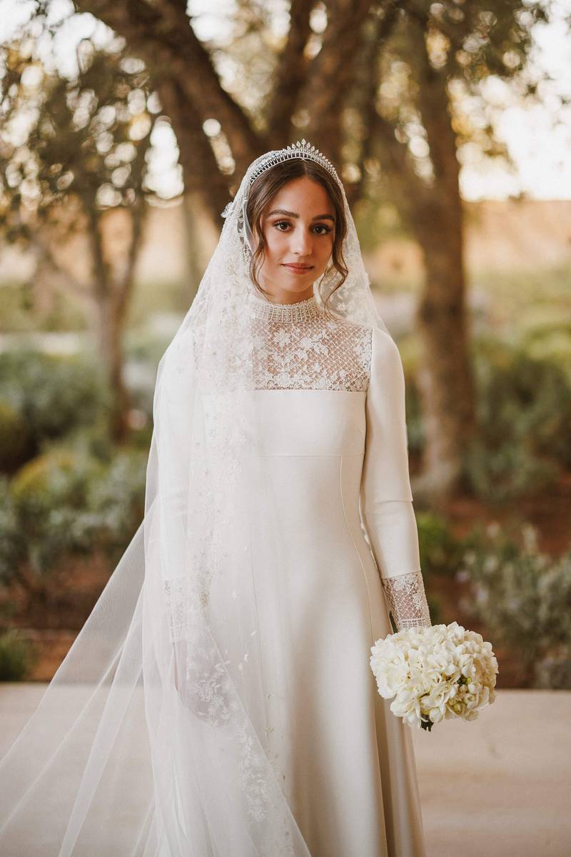 Jordan's Princess Iman wore custom Dior to marry Jameel Alexander Thermiotis. AFP