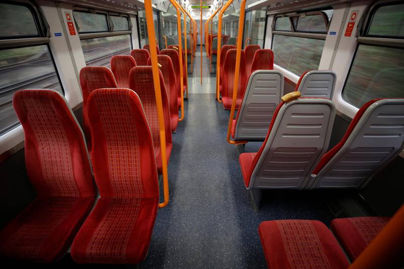 An empty train carriage on a South Western Railway train from Surbiton to Waterloo in London, just before 3pm local time. For most people, the new coronavirus causes only mild or moderate symptoms, such as fever and cough. For some, especially older adults and people with existing health problems, it can cause more severe illness, including pneumonia. AP Photo
