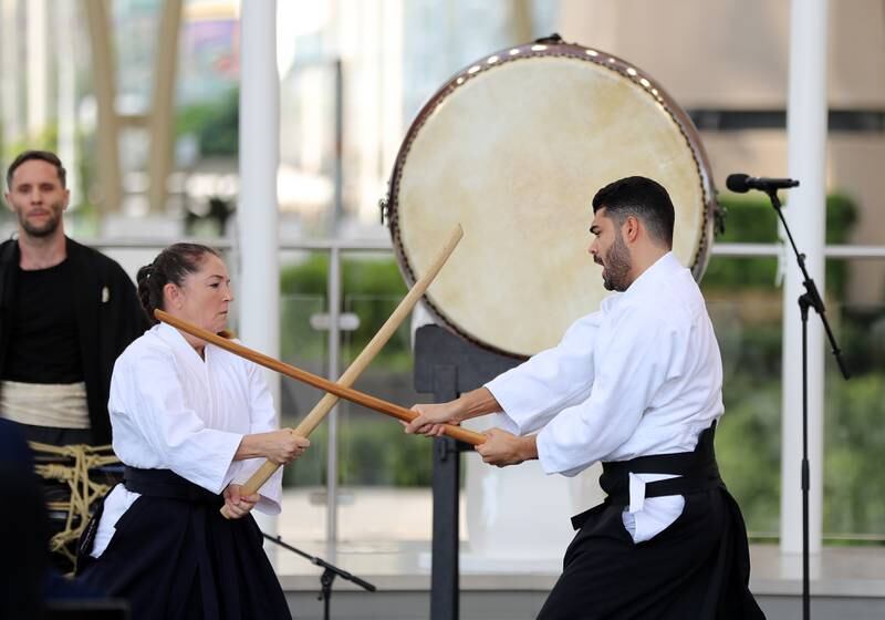 The modern Japanese martial art of Aikido is performed.