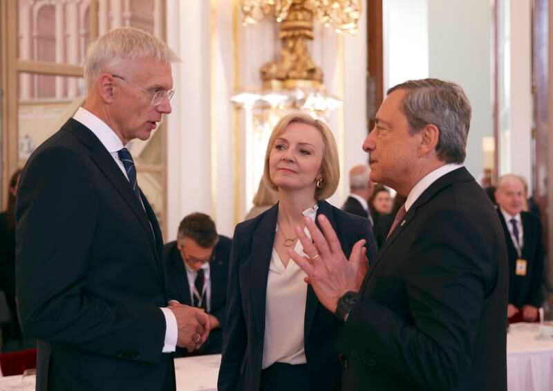 Latvian Prime Minister Arturs Krisjanis Karins, Liz Truss and Italian Prime Minister Mario Draghi. EPA