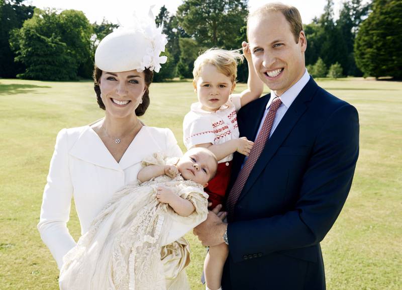 Prince George with his parents and younger sister Princess Charlotte, in a photograph released to celebrate his 2nd birthday in 2015. PA