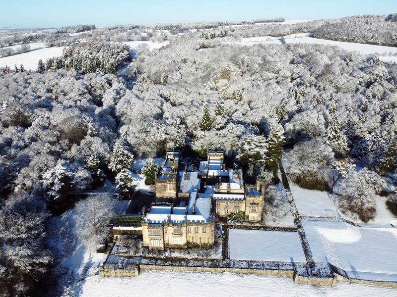 New snow covers Beaufront Castle near Hexham in Northumberland. PA