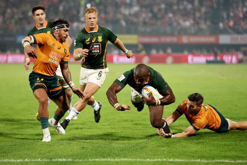 Siviwe Soyizwapi of South Africa dives for a try during the match against Australia on day one of the HSBC World Rugby Sevens Series in Dubai on Friday, December 2, 2022. Getty
