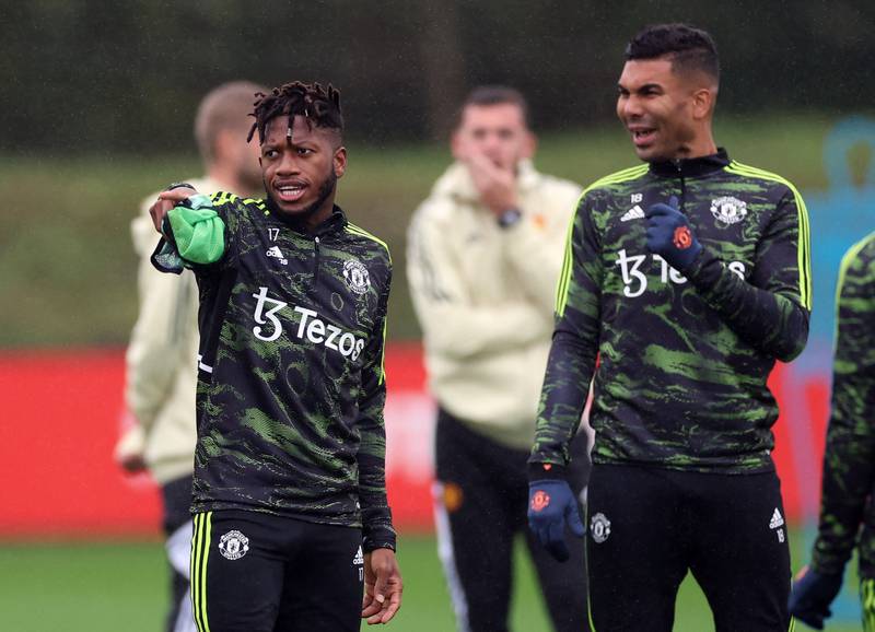 Manchester United's Fred with Casemiro during training. Reuters