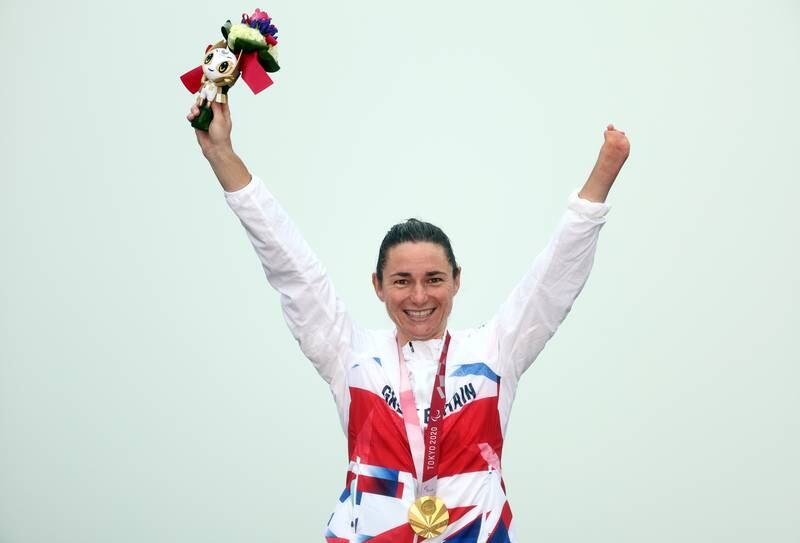 Gold medallist Sarah Storey of Britain celebrates on the podium after winning the women's C4-5 Road Race. Reuters