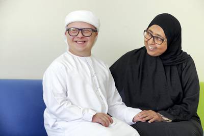 Dubai, July, 21, 2019: Dr Manal Jaroor, Founder Member-Chairperson, Emirates Down Syndrome Association  pose with his son Mahmoud Jaroor during the interview in Dubai. Satish Kumar/ For the National / Story by Ramola Talwar