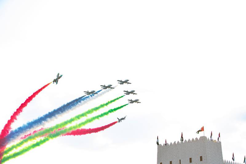 AL WATHBA, ABU DHABI, UNITED ARAB EMIRATES - December 03, 2019: The Al Forsan aerobatic team perform a flyby in the Union March, during the Sheikh Zayed Heritage Festival. 

(  Abdullah Al Neyadi for the Ministry of Presidential Affairs )
---