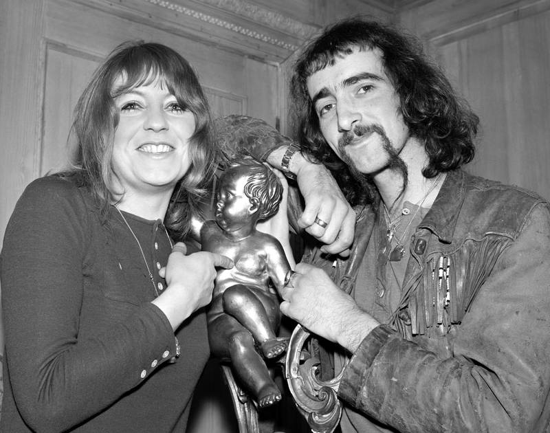 Fleetwood Mac bass guitarist John McVie and his future wife and bandmate Christine Perfect at a party for the band in London, 1969. AP