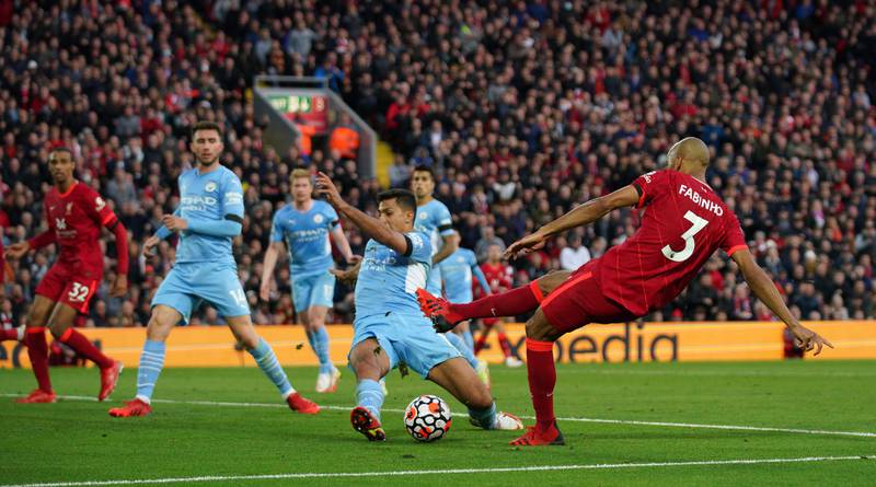 Manchester City's Rodri produces a superb block to deny Fabinho the chance to score a late winner for Liverpool. PA