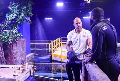 Mr Hamilton speaks with one of the aquarium's divers. 


