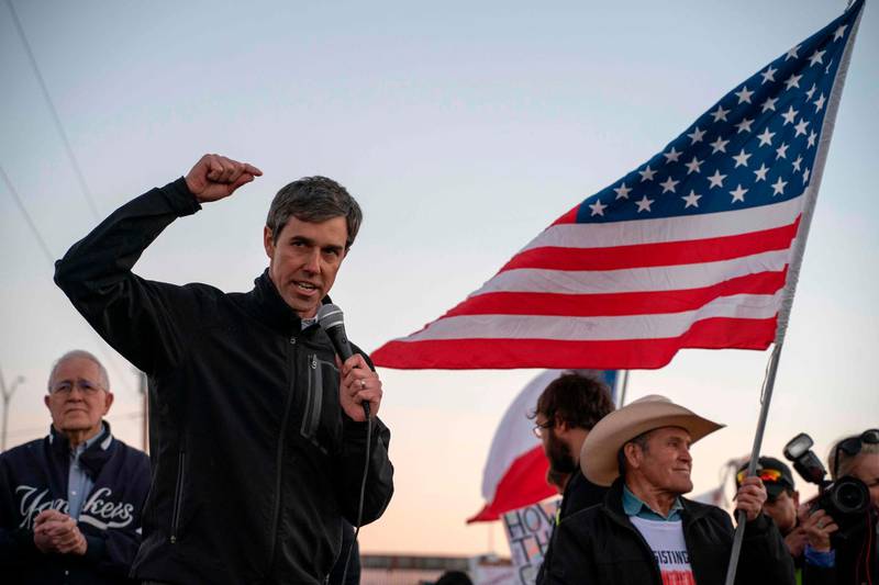 Former Texas Congressman Beto O'Rourke speaks to a crowd of marchers. AFP