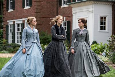 This image released by Sony Pictures shows, from left, Florence Pugh, Saoirse Ronan and Emma Watson in a scene from "Little Women." On Monday, Jan. 13, Ronan was nominated for an Oscar for best actress for her role in the film. (Wilson Webb/Sony Pictures via AP)