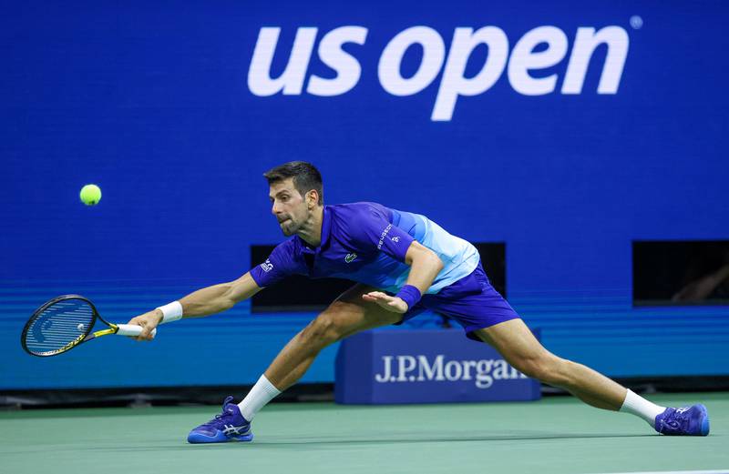 Novak Djokovic of Serbia returns the ball against Matteo Berrettini of Italy. AFP