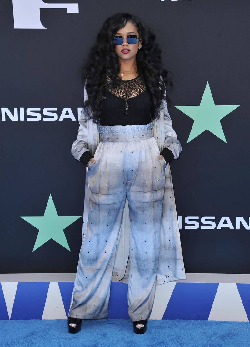 H.E.R. arrives at the BET Awards on June 23, 2019, in Los Angeles. AP