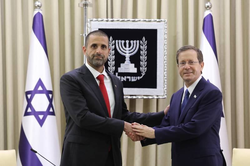 Khaled Yousef Al Jalahma, left, the first ambassador of Bahrain to Israel with the country's President Isaac Herzog. EPA