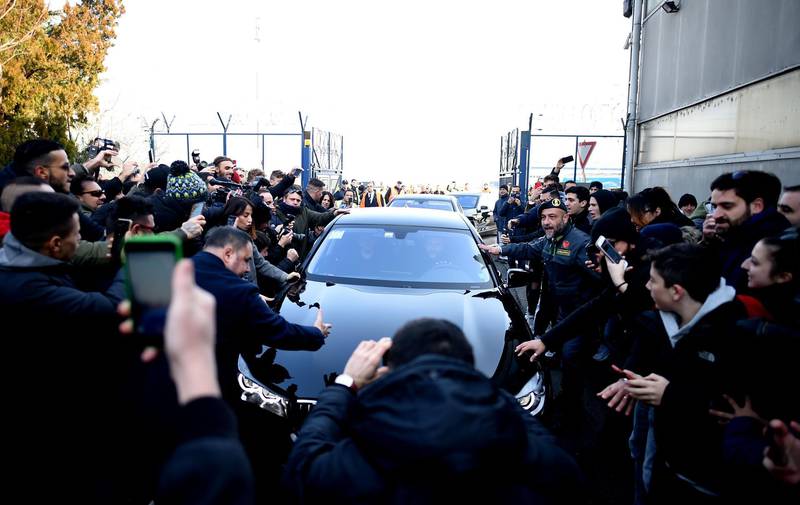 Ibrahimovic surrounded by supporters following his arrival at  Linate airport. AFP