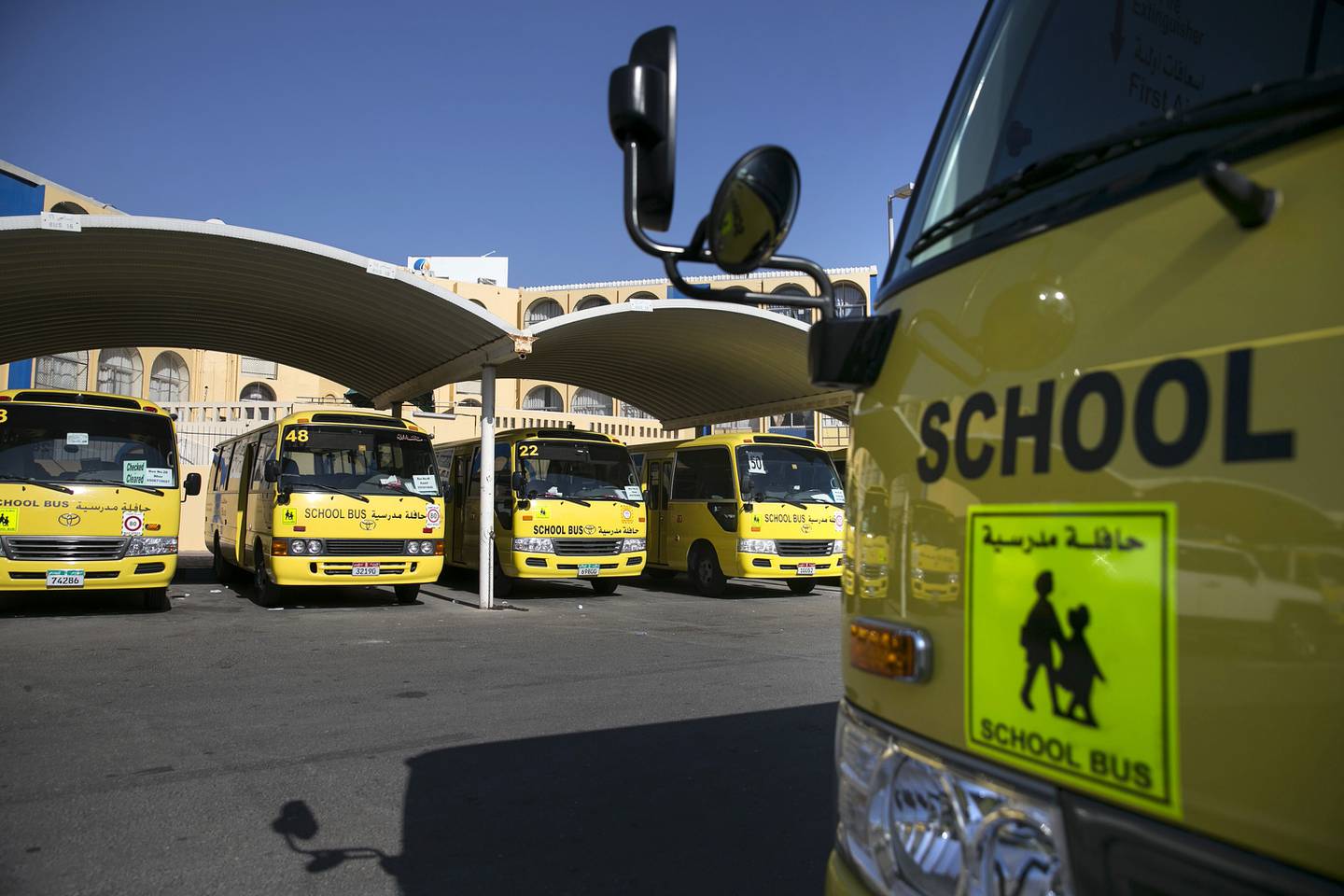 ABU DHABI, UNITED ARAB EMIRATES, Feb. 4, 2015:  
An exterior of a school bus as seen on Wednesday, Feb. 4, 2015, at the Al Nahda Schools'  school-bus parking lot. All new school busses are now equipped with seat belts, 2 internal and 4 external CCTV cameras. (Silvia Razgova / The National)  /  Usage: Feb. 4, 2015 /  Section: NA /  Reporter:  Ramona Ruiz
 *** Local Caption ***  SR-150204-schoolbusses10.jpg