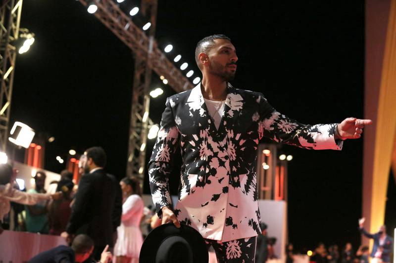 Egyptian actor Hassan Abouelrouss poses on the red carpet