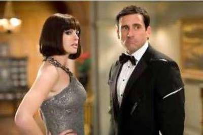 ANNE HATHAWAY stars as Agent 99 and STEVE CARELL stars as Maxwell Smart in Warner Bros. PicturesÕ and Village Roadshow PicturesÕ action comedy ÒGet Smart,Ó distributed by Warner Bros. Pictures. Courtesy Warner BrosREF al10filmSMART 10/07/08