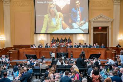 A video showing former White House press secretary Kayleigh McEnany is displayed as Ms Hutchinson gives evidence. AFP