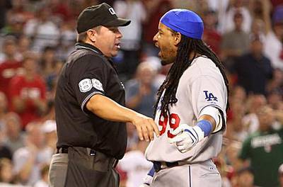 Manny Ramirez argues with home plate umpire Doug Eddings after being ejected against the Arizona Diamondbacks.