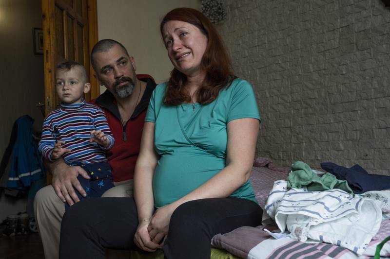 Heavily pregnant Dr Marta Kopan, who fled Kyiv with her husband Dr Maxim Motsya and their three-year-old son Makar, narrates their ordeal at a relative's place in Lviv. AP