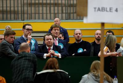 Brexit Party members watch as ballots are tallied at a counting centre for Britain's general election in Hartlepool, Britain.  Reuters