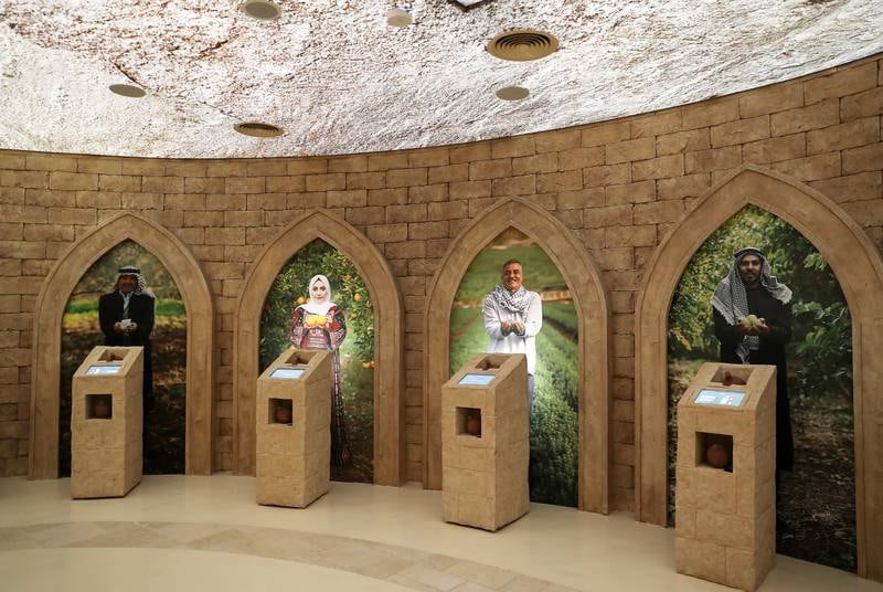 Visitors will learn about Palestine's deep history and ancient buildings as they take an lift ride that simulates rising high above the bustling streets of Jerusalem. Pawan Singh / The National
