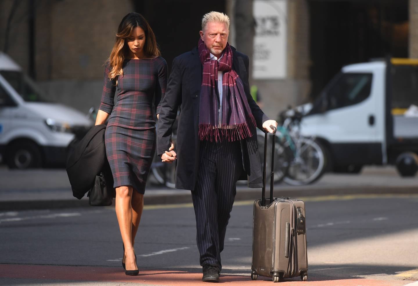 Former Wimbledon Champion and sports commentator Boris Becker arrives with his partner Lillian de Carvalho at Southwark Crown Court in London. EPA