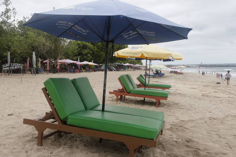 Empty sun chairs at Kuta beach, on the ever-popular holiday hotspot Bali. AP Photo