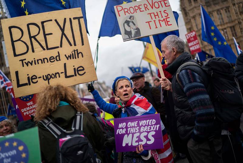 epa07329947 Pro and Anti EU campaigners rally outside of the Parliament in London, Britain, 29 January 2019. The House of Commons is set to vote on amendments to British Prime Minister May's Brexit plan in parliament on 29 January.  EPA/WILL OLIVER