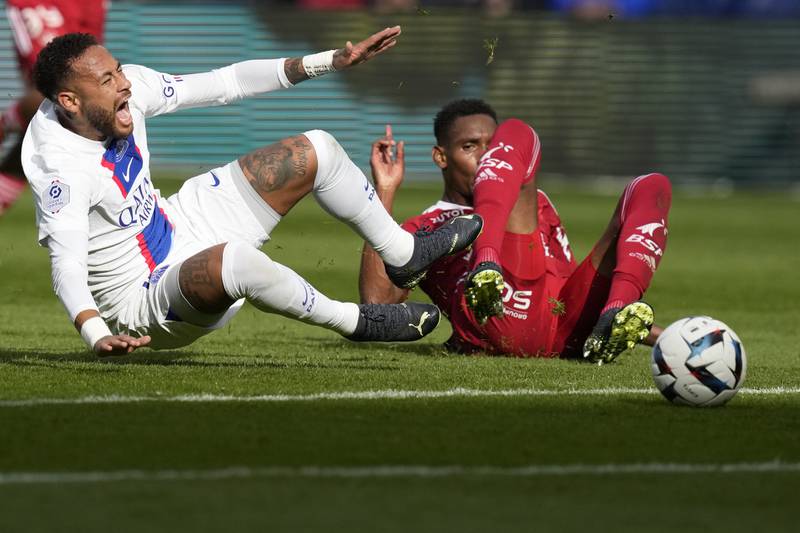 Neymar grimaces in pain after being fouled by Brest's Christophe Herelle. AP
