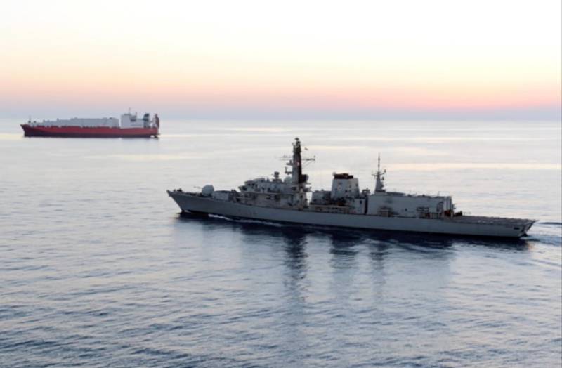 In this image from file video provided by UK Ministry of Defence, British navy vessel HMS Montrose escorts another ship during a mission to remove chemical weapons from Syria at sea off coast of Cyprus in February 2014. The British Navy said it intercepted an attempt on Thursday, July 11, 2019, by three Iranian paramilitary vessels to impede the passage of a British commercial vessel just days after Iranâ€™s president warned of repercussions for the seizure of its own supertanker. A U.K. government statement said Iranian vessels only turned away after receiving â€œverbal warningsâ€ from the HMS Montrose accompanying the commercial ship through the narrow Strait of Hormuz. (UK Ministry of Defence via AP)