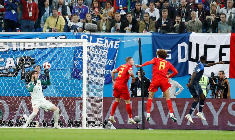 Belgium's Thibaut Courtois can only watch as the ball hits the back of the net. AP Photo