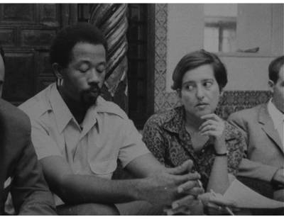 Eldridge Cleaver, left, one of the leaders of the Black Panther movement, and Elaine Mokhtefi at the National Liberation Front's headquarters in Algiers in 1969. Courtesy Elaine Mokhtefi