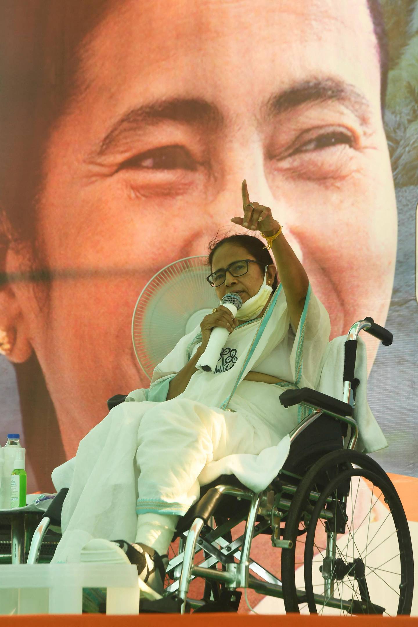 Chief Minister of West Bengal Mamata Banerjee addresses a public meeting during an election campaign at her constituency ahead of the 2nd phase of the state Legislative Assembly election in Nandigram around 160 kms west of Kolkata on March 30, 2021. (Photo by Dibyangshu SARKAR / AFP)