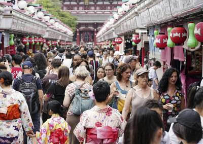 The Nakamise shopping street in Tokyo's Asakusa district. Japan’s economic growth jumped at an annual pace of 6% in the April-June period. AP
