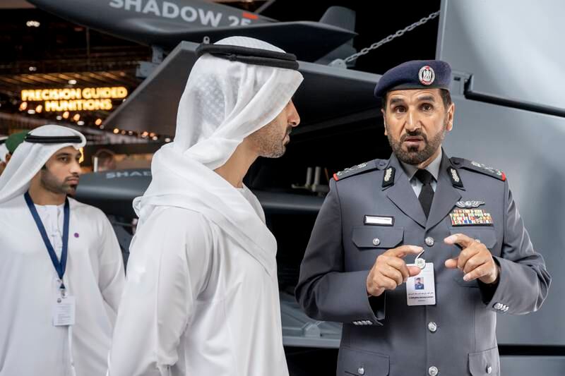 Sheikh Hamdan bin Mohamed, left, and Abu Dhabi Police chief Maj Gen Al Mazrouei visit Idex