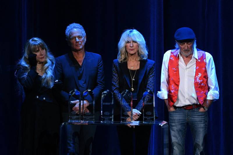 Fleetwood Mac accept their award on stage at the 2018 MusiCares Person of the Year gala at Radio City Music Hall in New York. AFP
