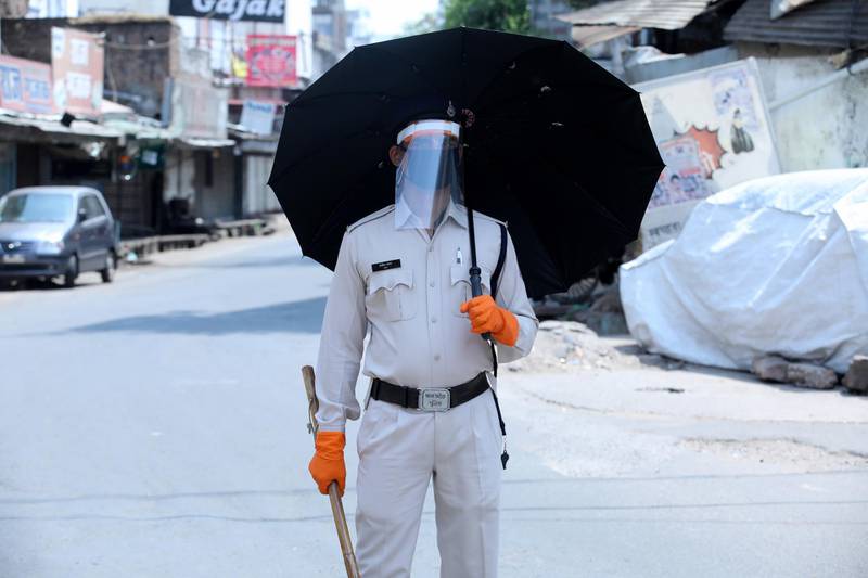 An Indian policeman patrols the streets during coronavirus lockdown in Bhopal, India. EPA