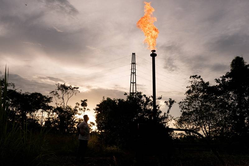 A gas flare in Lago Agrio, Ecuador. Global emissions rose at a slower rate last year, an IEA report says. Reuters