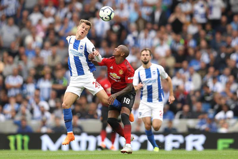 Solomon March of Brighton and Ashley Young of Manchester United battle for the ball. Getty Images